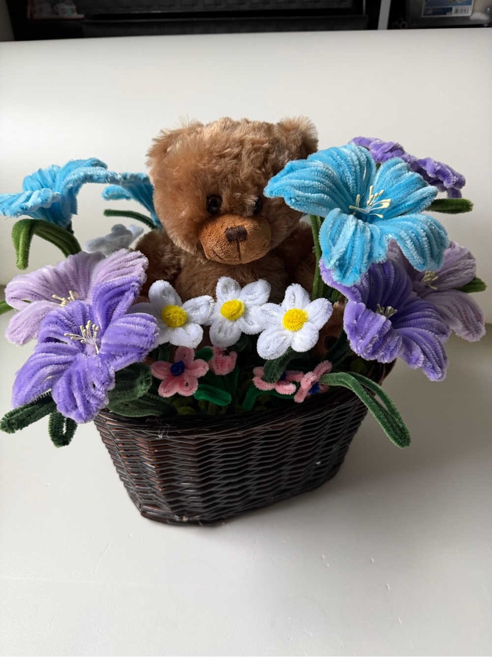 Plush Brown Teddy in Blue, Purple & White Flower Basket